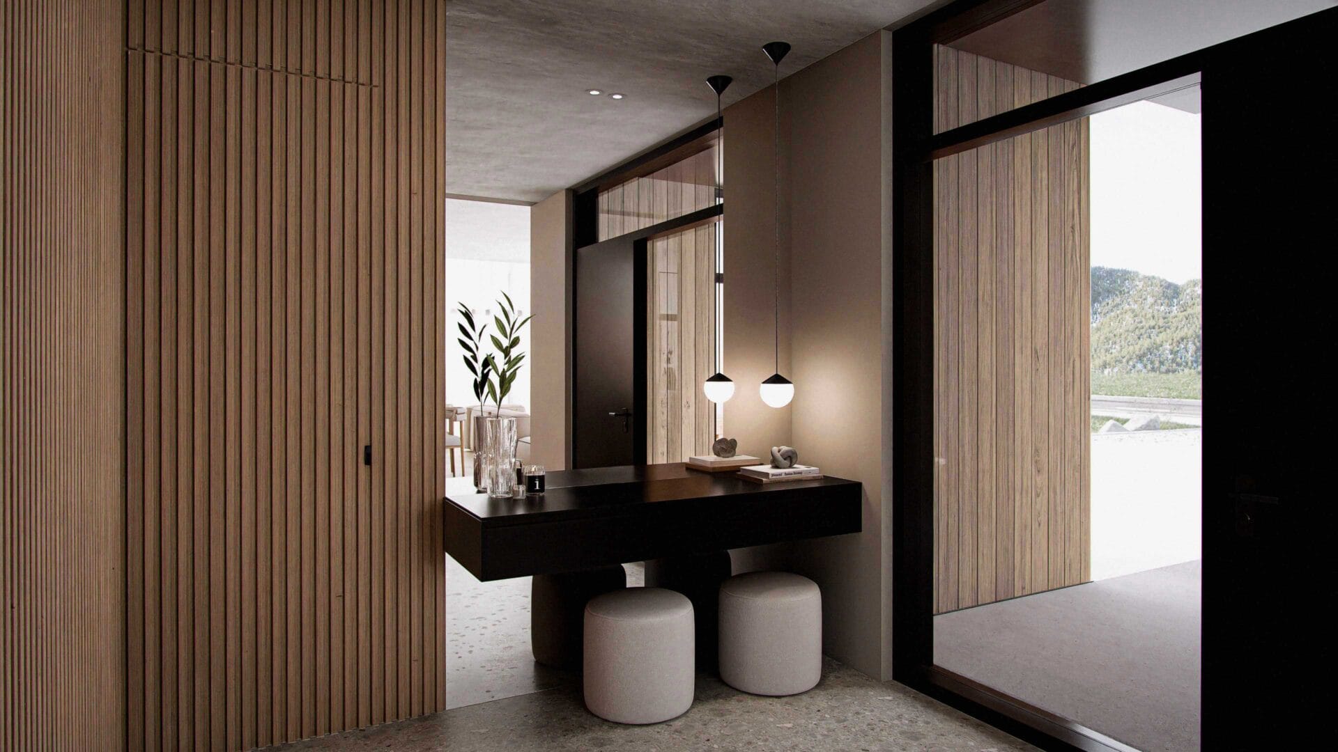 Solaris interior entry with black steel front door featuring tempered safety glass, seamless wood interior garage access, large mirror, and preparation table